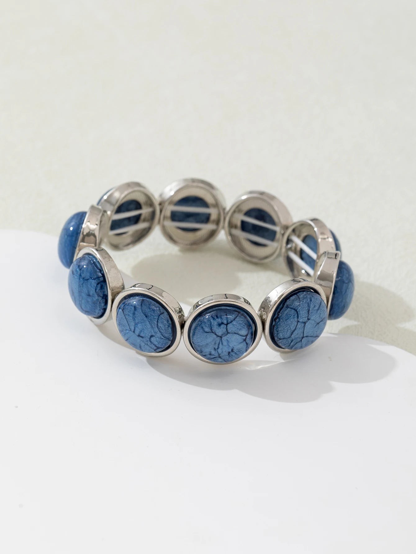 1 acrylic bracelet in a round shape with various colors and sizes, perfectly fitting the styles. It's a fashionable accessory fo