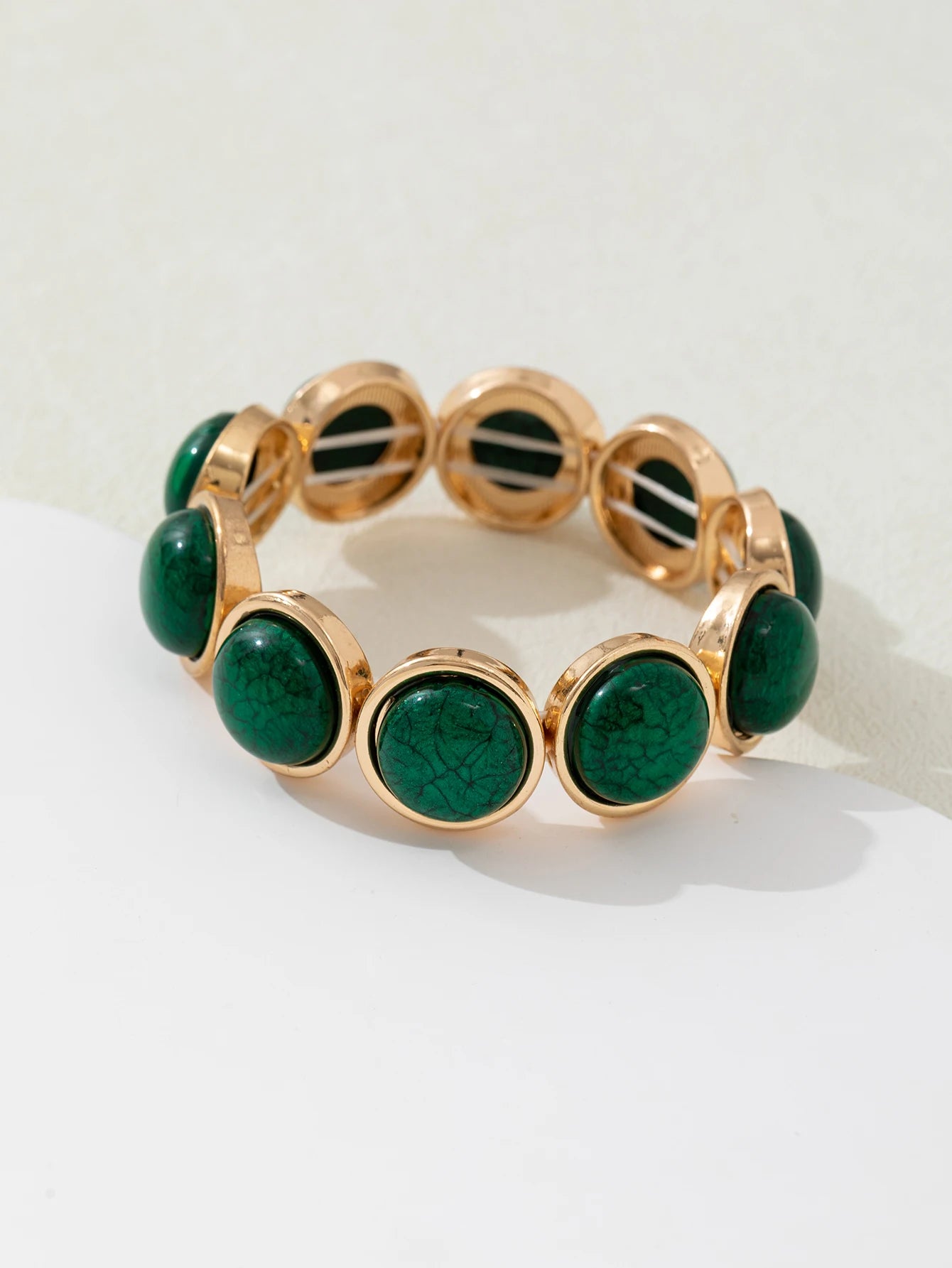 1 acrylic bracelet in a round shape with various colors and sizes, perfectly fitting the styles. It's a fashionable accessory fo