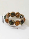 1 acrylic bracelet in a round shape with various colors and sizes, perfectly fitting the styles. It's a fashionable accessory fo